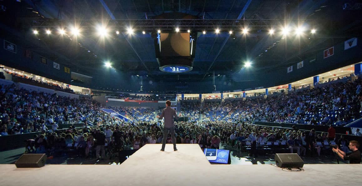 Adam Cheyer delivering keynote to large stadium audience